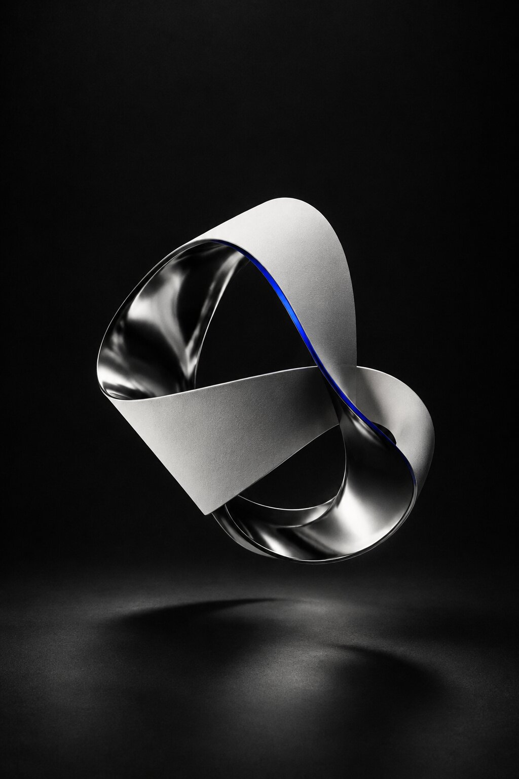 Illustrative abstract chrome sculpture